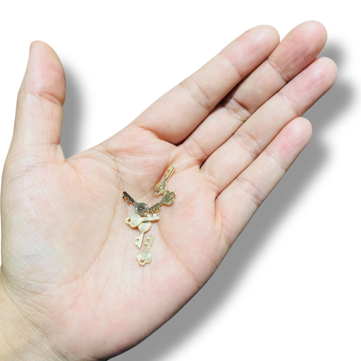 3pz de Llavecita de Chapa de Oro