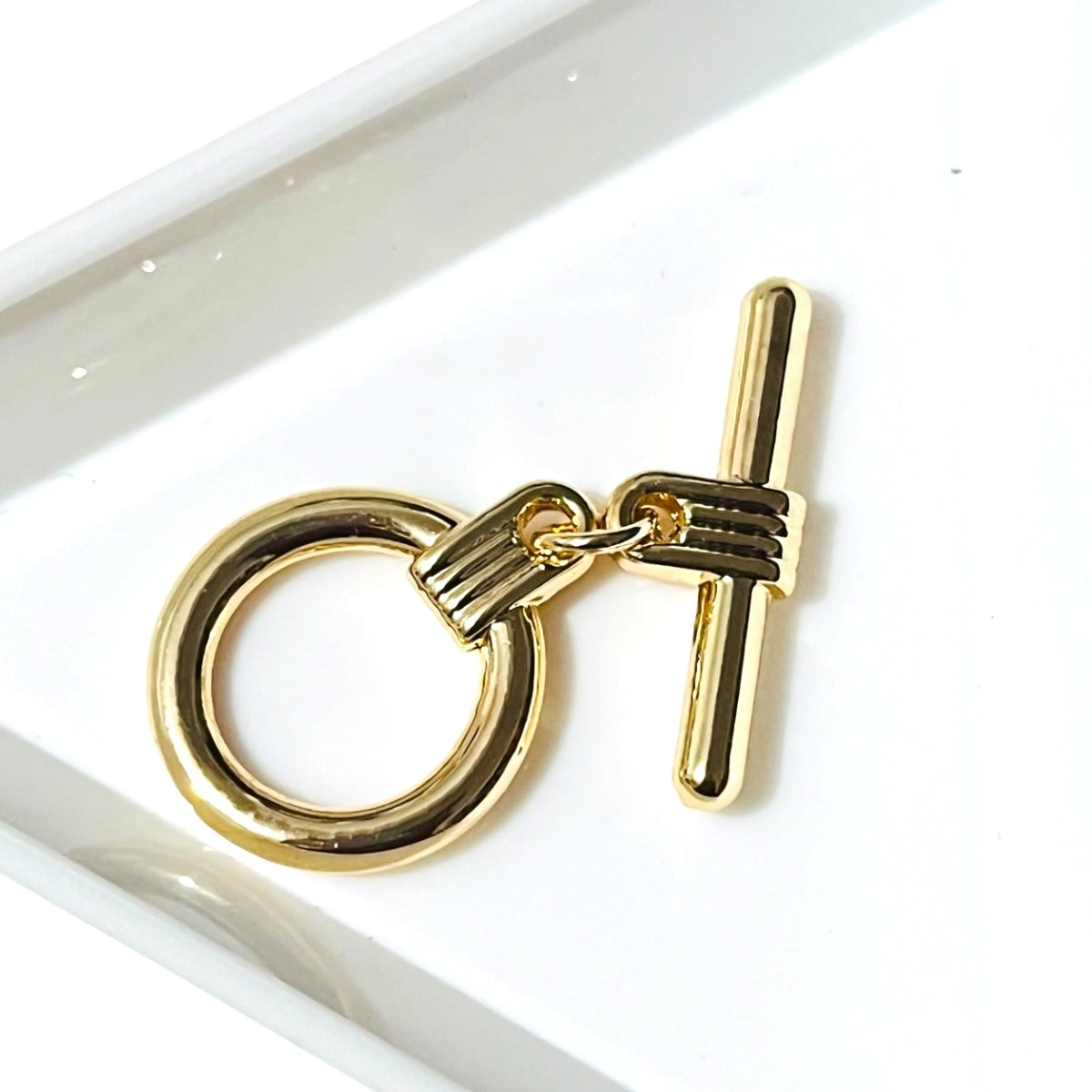 Broche tipo “T” 20mm Chapa de Oro
