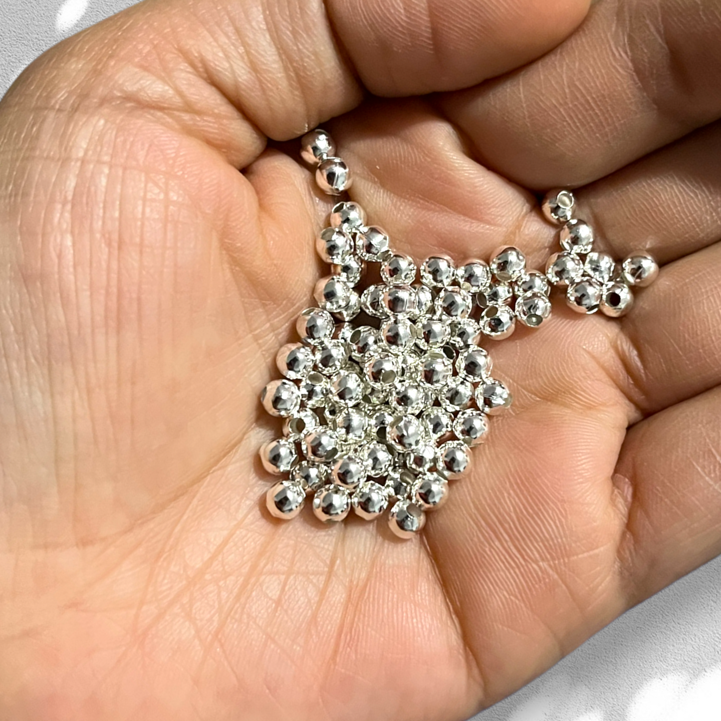 500 gr de separador metálico en oro y plata