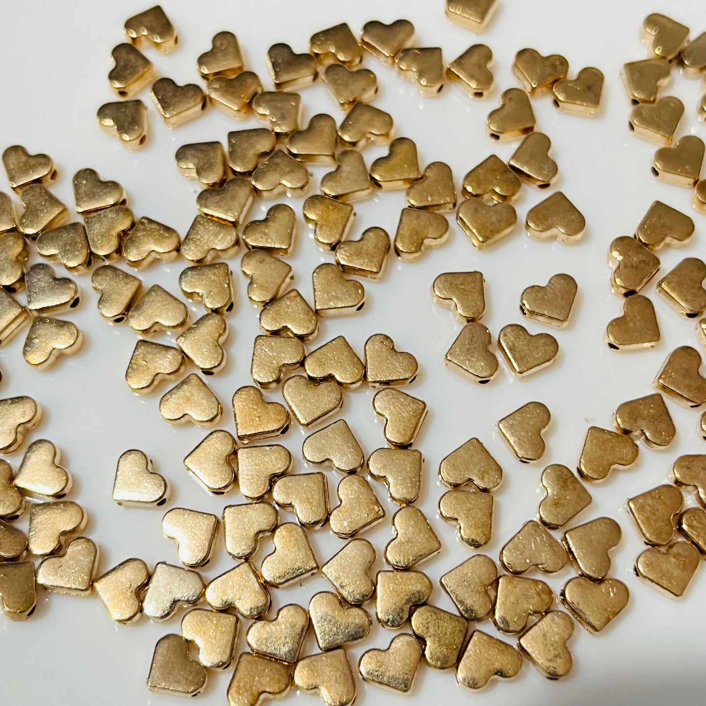 Corazón metálico para armando de pulseras y bisutería