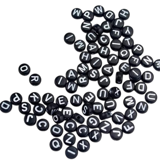 100 pz letra Negro con Blanco