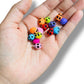 100 Pz de Calaveras Acrílicas de colores para pulseras