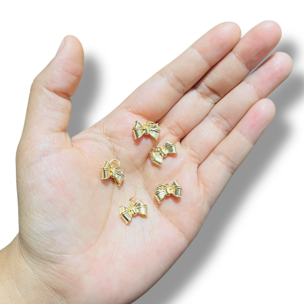 1 pz Moño Chapa de Oro 3D