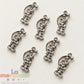 Pack 50 Dijes de Santa Muerte Plateados de Plastimetal 3 cm