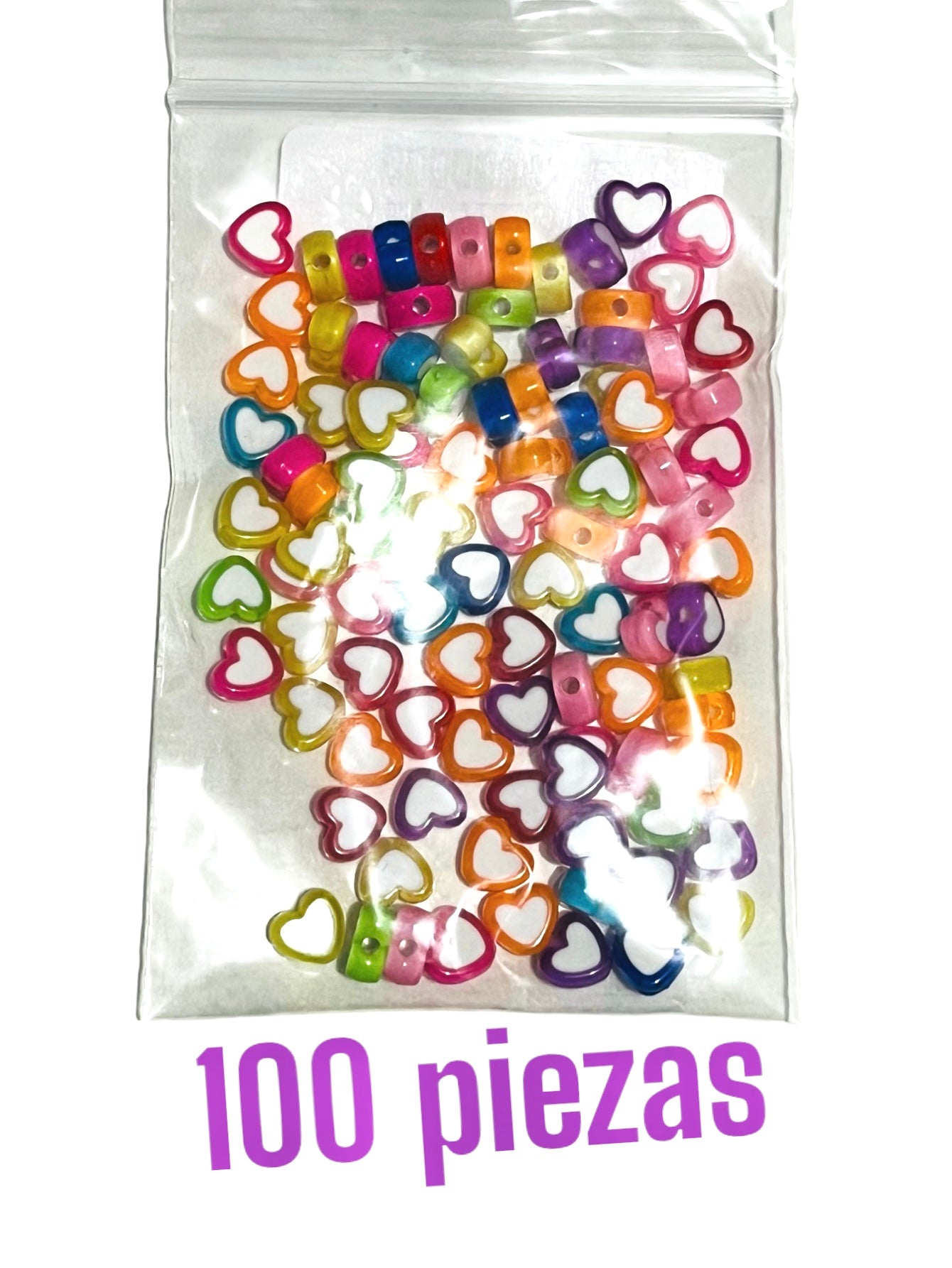 100 piezas corazón con centro blanco